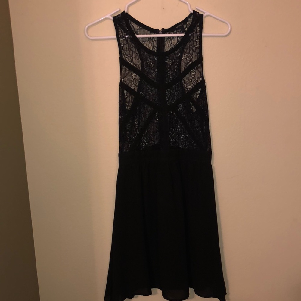 Lacy, sleeveless, black mini dress from Forever 21. Size small.